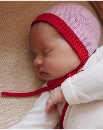 Hvid Baby-Mütze mit Bindebändchen 'Dolly' aus Merinowolle - Cotton Candy/Red