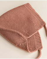 hvid-baby-muetze-dolly-mit-bindebaendchen-aus-merinowolle-terracotta