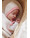 hvid-baby-muetze-mit-bindebaendchen-dolly-aus-merinowolle-cream-bubblegum